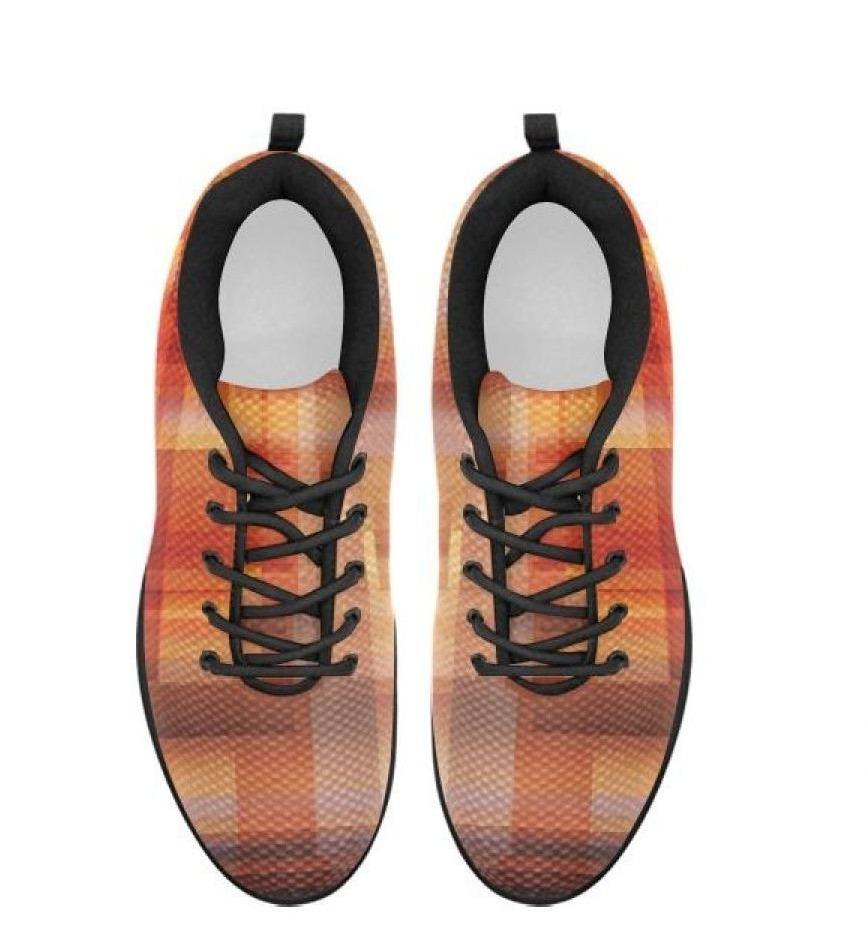 Stylish women's sneakers in geometric brown and black design, perfect for running and workouts.