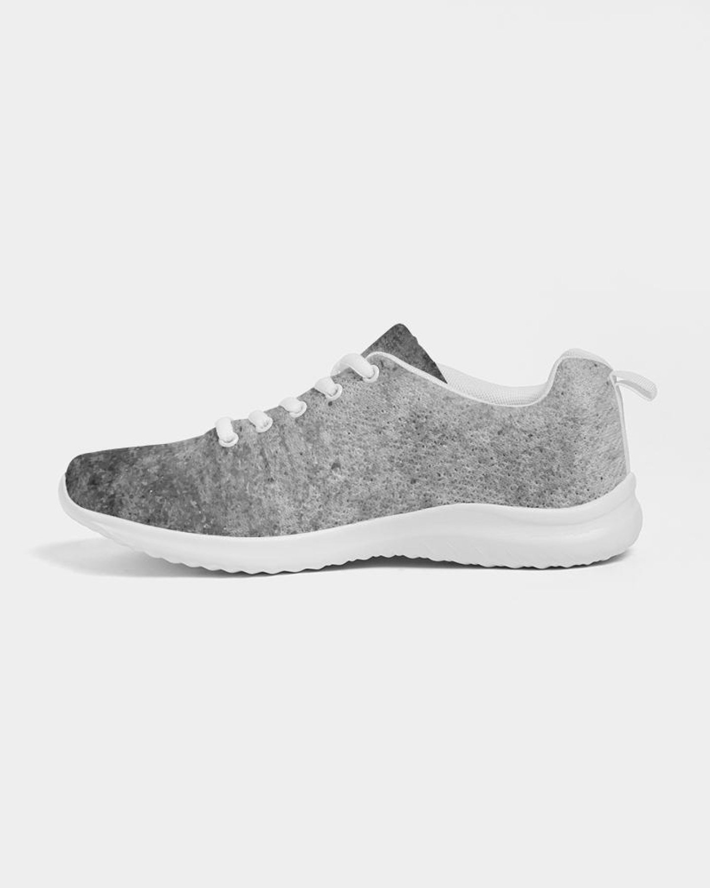 A pair of women's grey tie-dye style canvas sports shoes, featuring a lace-up front, padded collar, and soft insole, ideal for running and casual wear.