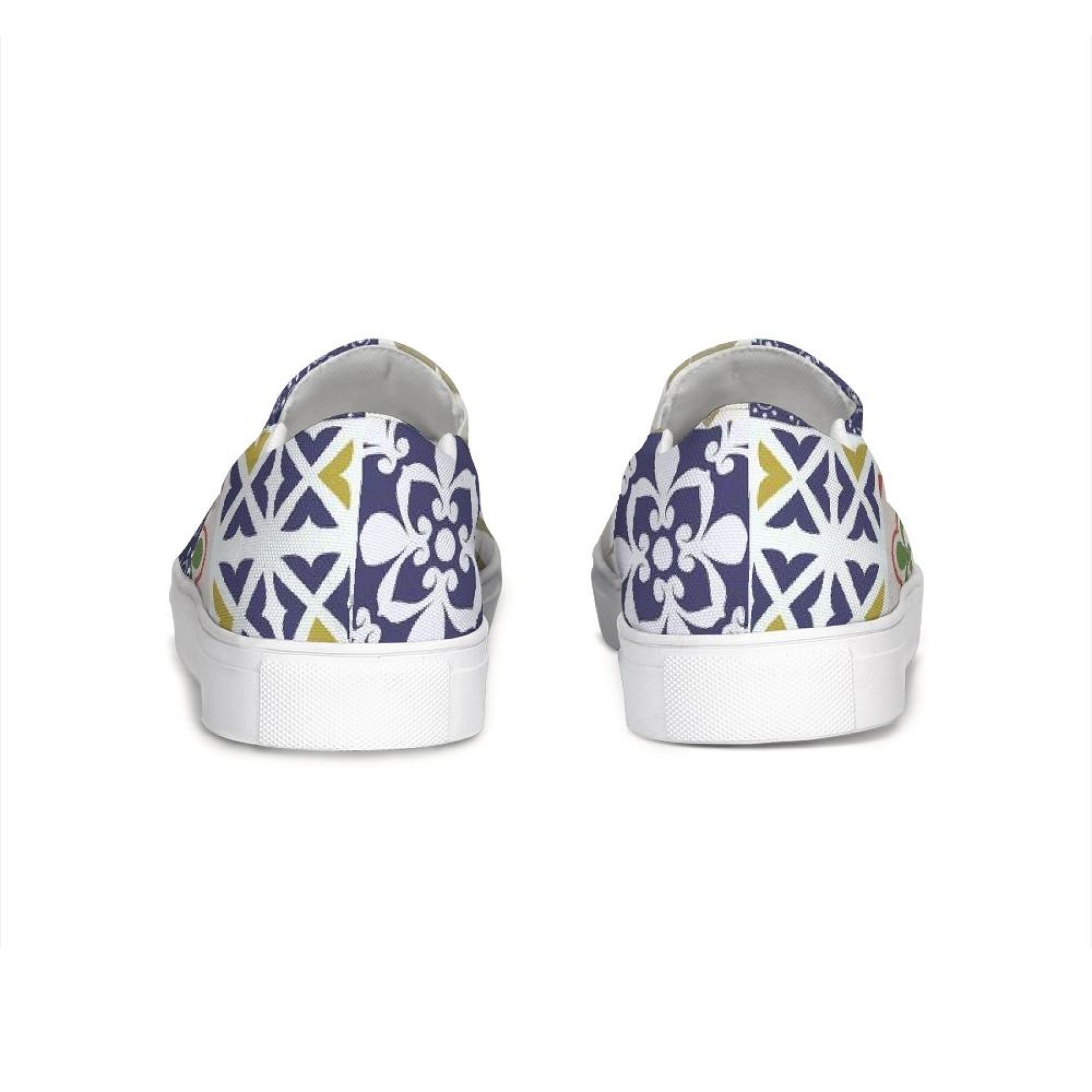 A pair of women's multicolor patch style low top slip-on canvas sneakers, showcasing vibrant colors and a stylish design.