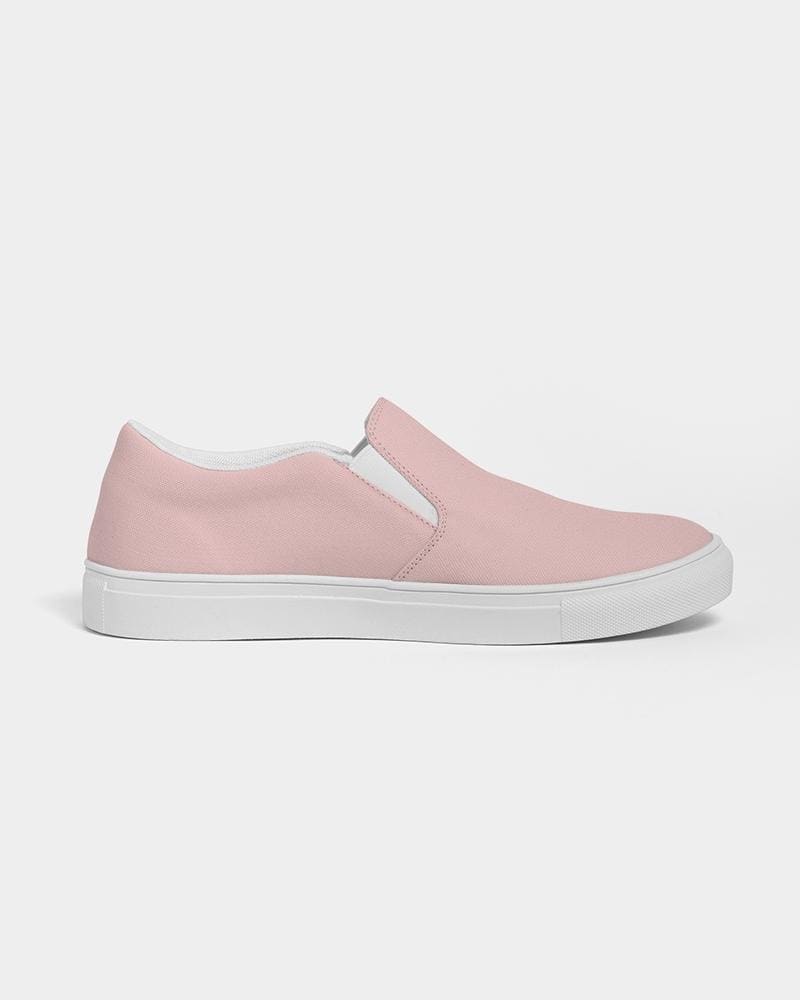 A pair of stylish women's slip-on canvas sports shoes in rose pink, featuring elastic side accents and a padded collar for comfort.