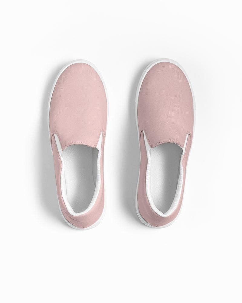 A pair of stylish women's slip-on canvas sports shoes in rose pink, featuring elastic side accents and a padded collar for comfort.