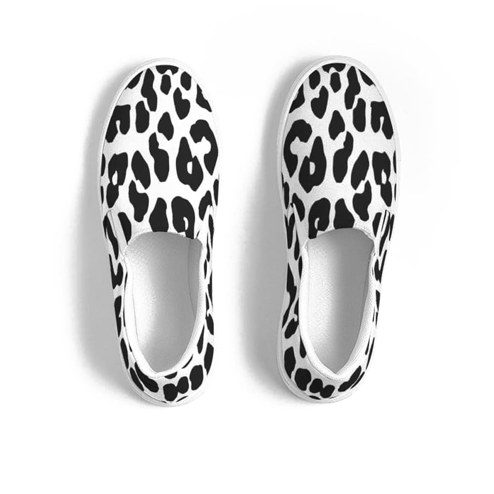 A pair of women's slip-on canvas sneakers featuring a stylish black and white leopard print design, perfect for casual wear.