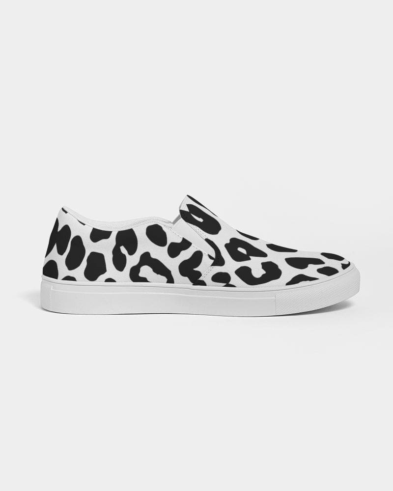 A pair of women's slip-on canvas sneakers featuring a stylish black and white leopard print design, perfect for casual wear.