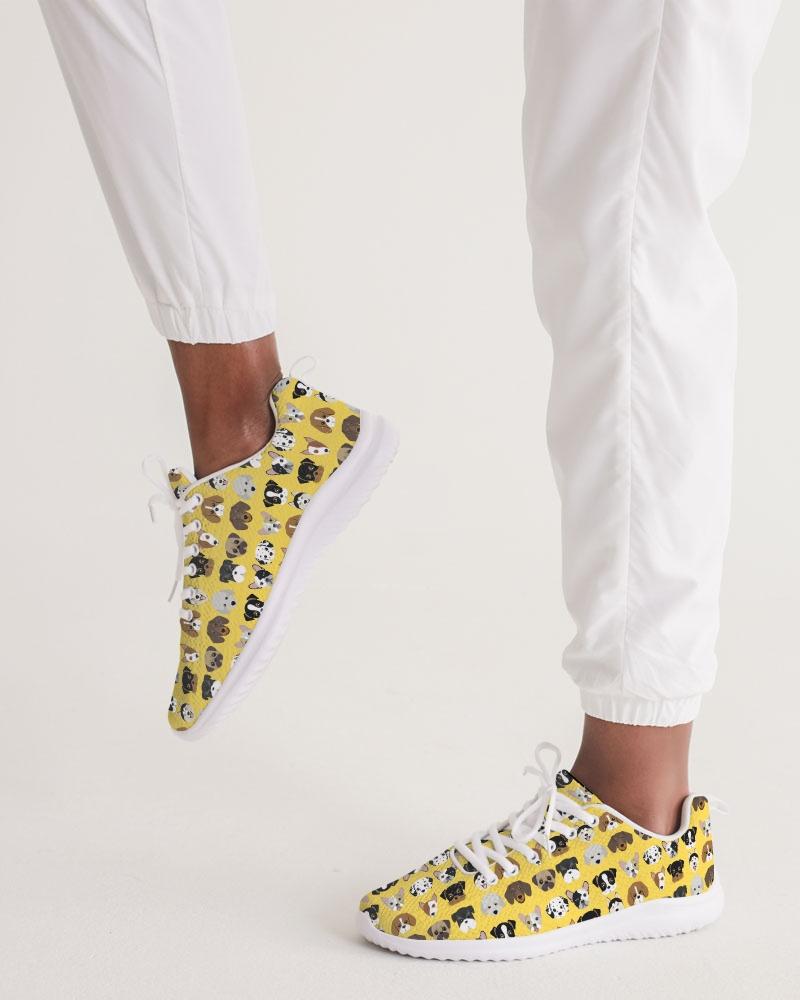 A pair of Women's Yellow Doggie Love Low Top Canvas Running Shoes featuring a vibrant yellow color with a playful dog pattern, designed for comfort and style.