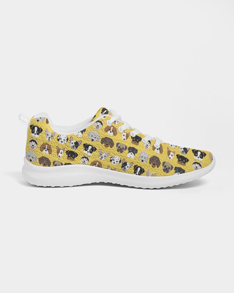 A pair of Women's Yellow Doggie Love Low Top Canvas Running Shoes featuring a vibrant yellow color with a playful dog pattern, designed for comfort and style.