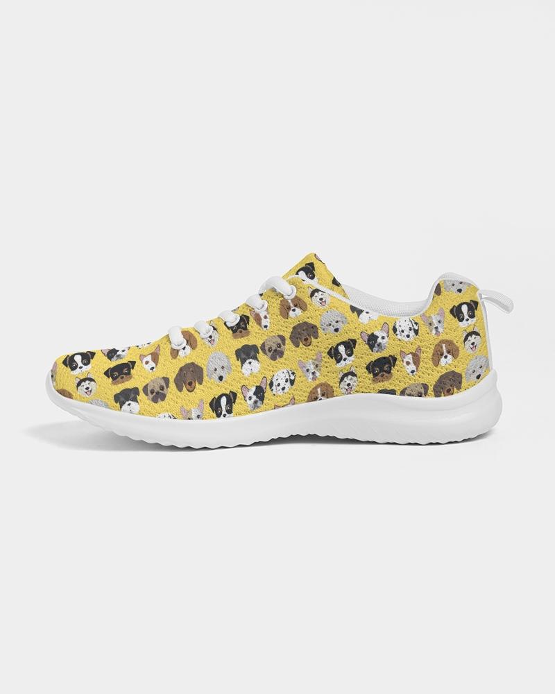 A pair of Women's Yellow Doggie Love Low Top Canvas Running Shoes featuring a vibrant yellow color with a playful dog pattern, designed for comfort and style.