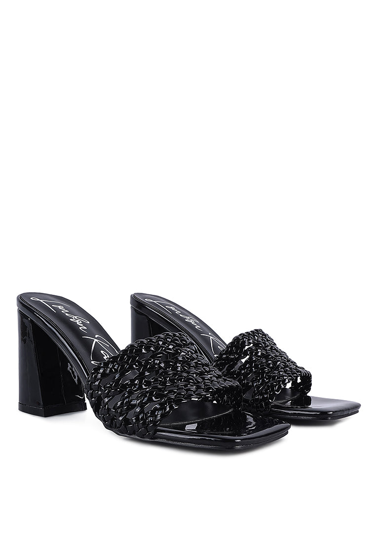 Adorbs Braided Straps Slip On Sandals featuring a stylish braided design, soft cushion insole, and block heels in a chic patent faux leather finish.