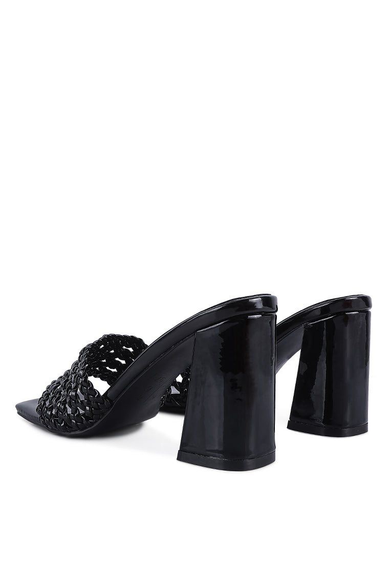 Adorbs Braided Straps Slip On Sandals featuring a stylish braided design, soft cushion insole, and block heels in a chic patent faux leather finish.