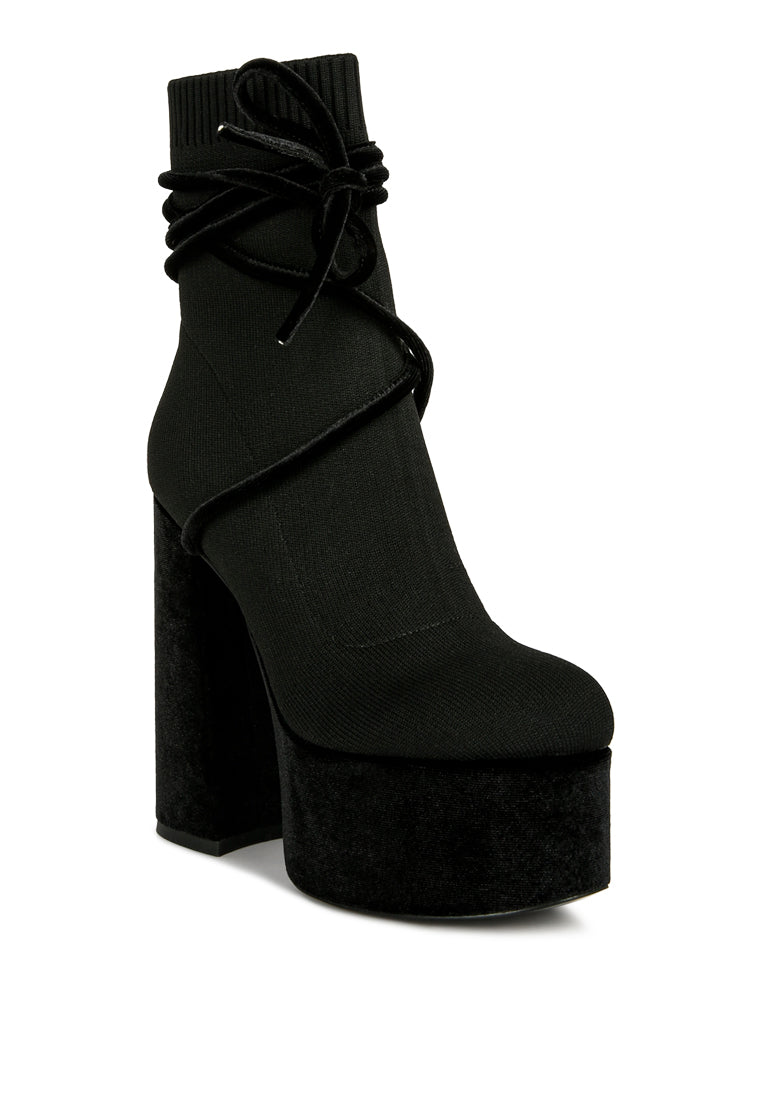 After Pay High Heel Velvet Knitted Boot featuring a chunky velvet platform heel and knitted exterior with lace-up detail.