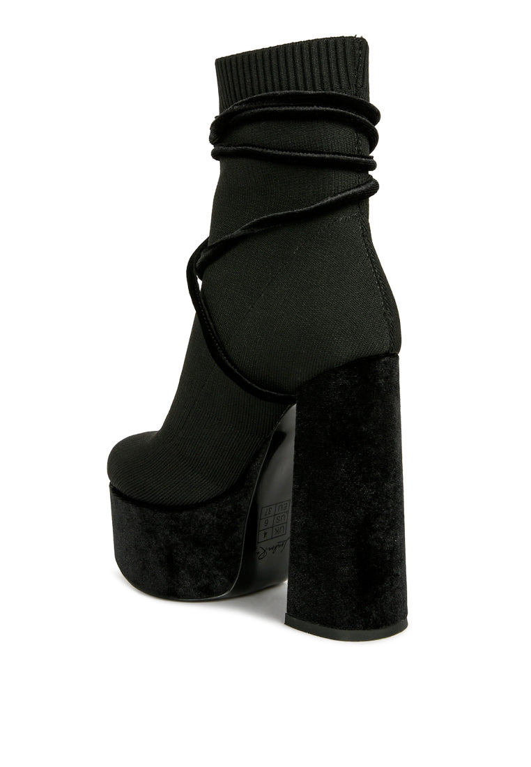 After Pay High Heel Velvet Knitted Boot featuring a chunky velvet platform heel and knitted exterior with lace-up detail.