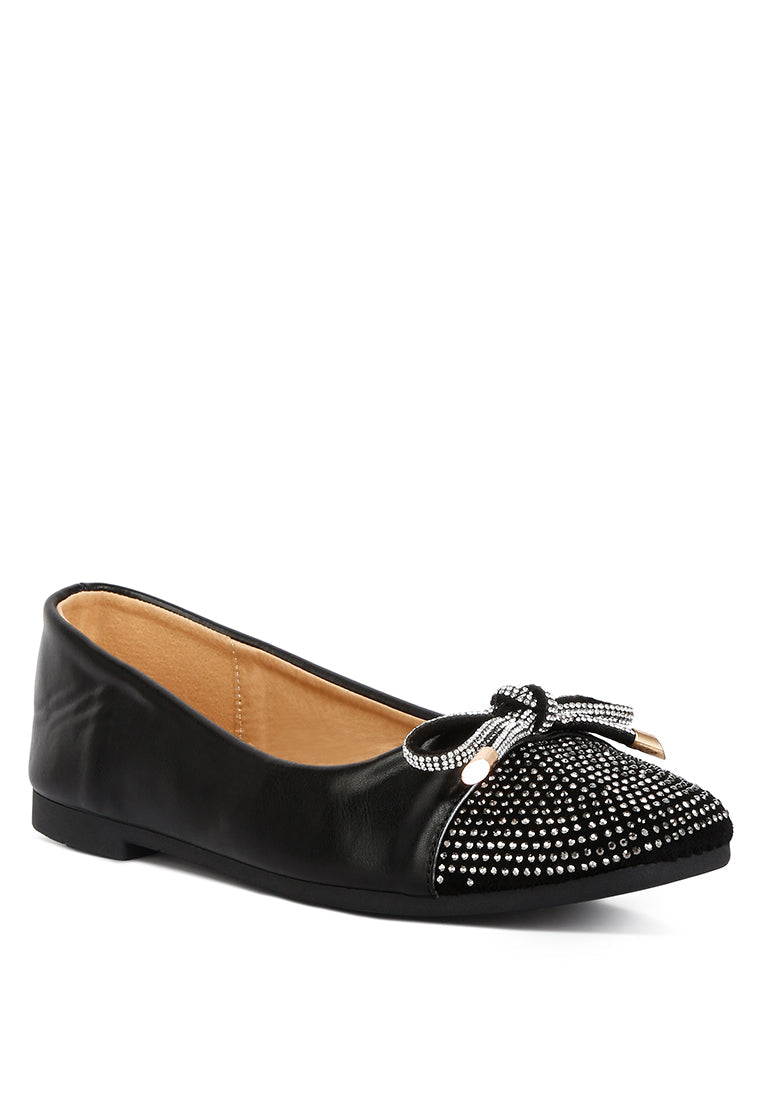 Aine Rhinestones Embellished Toe Cap Ballerinas featuring a faux leather upper, rhinestone toe cap, and elegant bow detail.