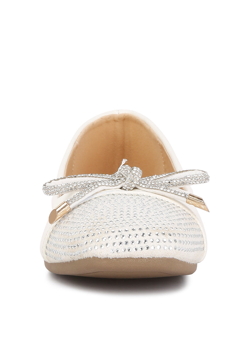 Aine Rhinestones Embellished Toe Cap Ballerinas featuring a faux leather upper, rhinestone toe cap, and elegant bow detail.