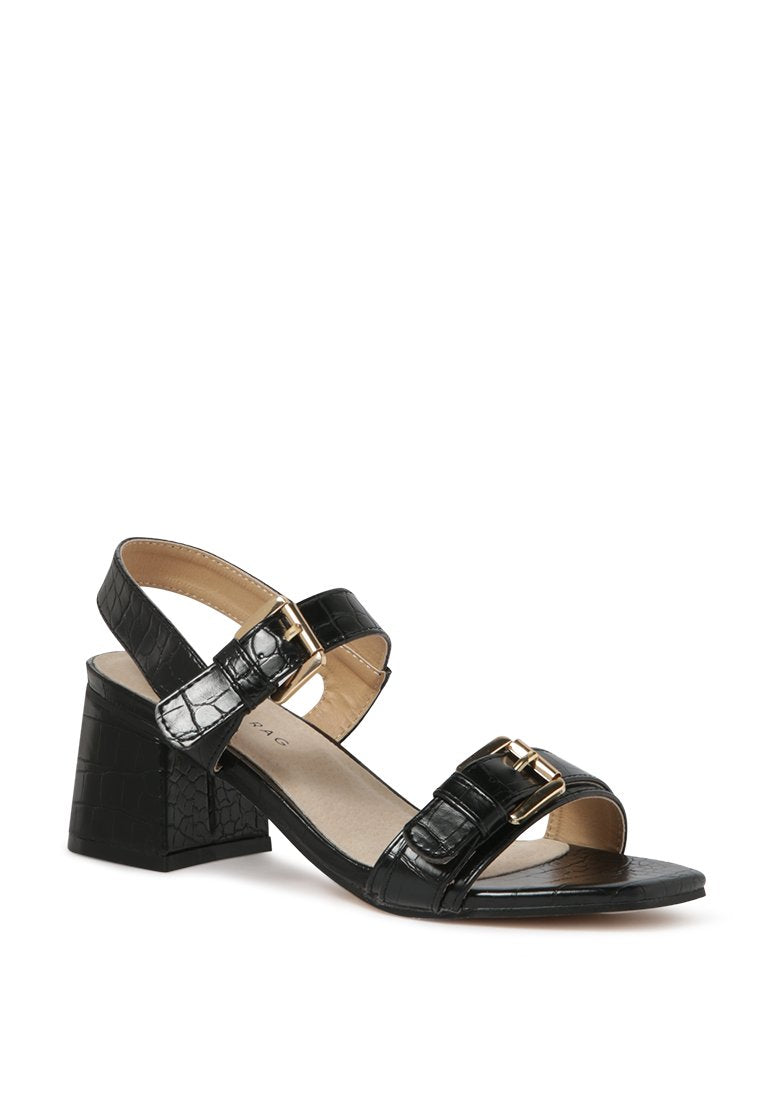 Amara Croc Textured Slingback Sandals featuring a block heel and adjustable buckle in stylish croc print faux leather.