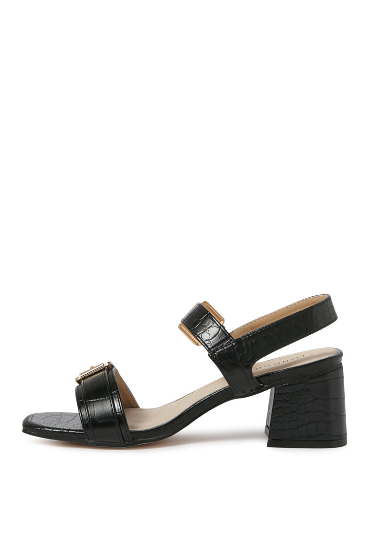 Amara Croc Textured Slingback Sandals featuring a block heel and adjustable buckle in stylish croc print faux leather.