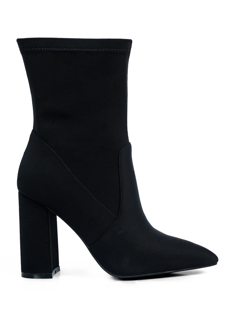 A pair of stylish ankle Lycra block heeled boots with a pointed toe and side zipper, perfect for women's fashion.