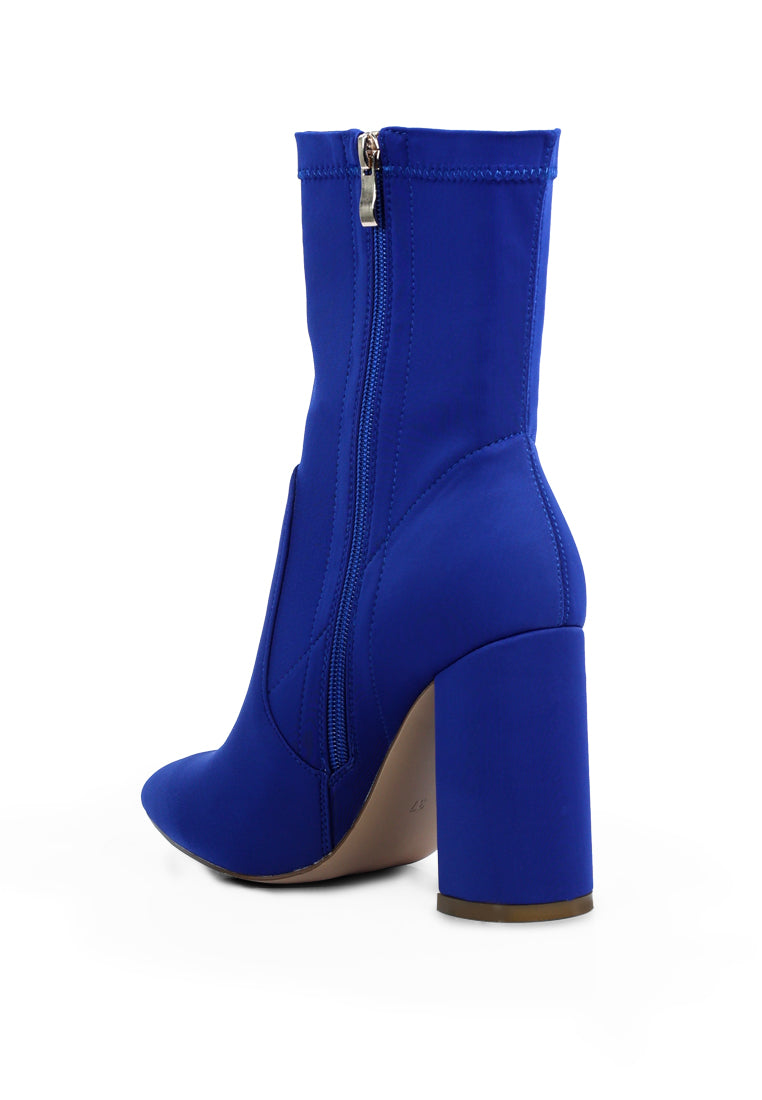 A pair of stylish ankle Lycra block heeled boots with a pointed toe and side zipper, perfect for women's fashion.