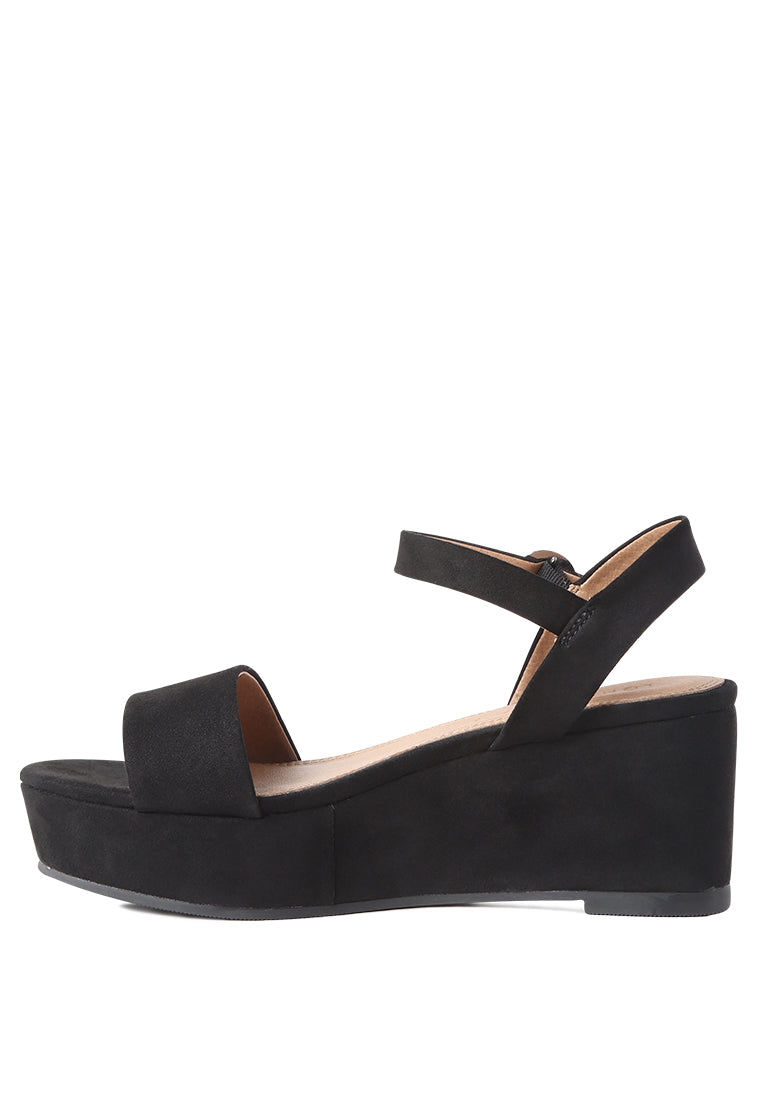 A pair of stylish Ankle Strap Wedge Sandals featuring a platform heel and adjustable buckle, perfect for summer wear.