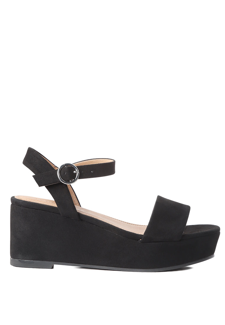 A pair of stylish Ankle Strap Wedge Sandals featuring a platform heel and adjustable buckle, perfect for summer wear.