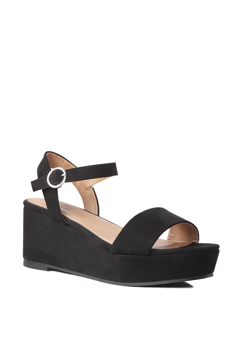 A pair of stylish Ankle Strap Wedge Sandals featuring a platform heel and adjustable buckle, perfect for summer wear.