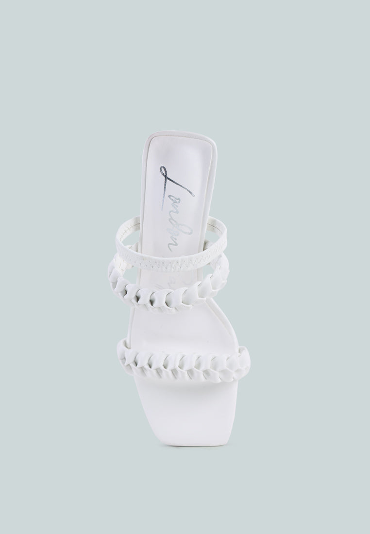 Arnie Braided Straps Block Heeled Sandals showcasing elasticated woven straps and a square-cut toe design.