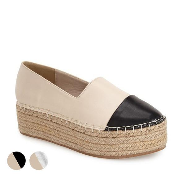 AZALIAH shoes featuring a vegan leather upper and a 2-inch espadrille platform, perfect for stylish and eco-conscious wearers.