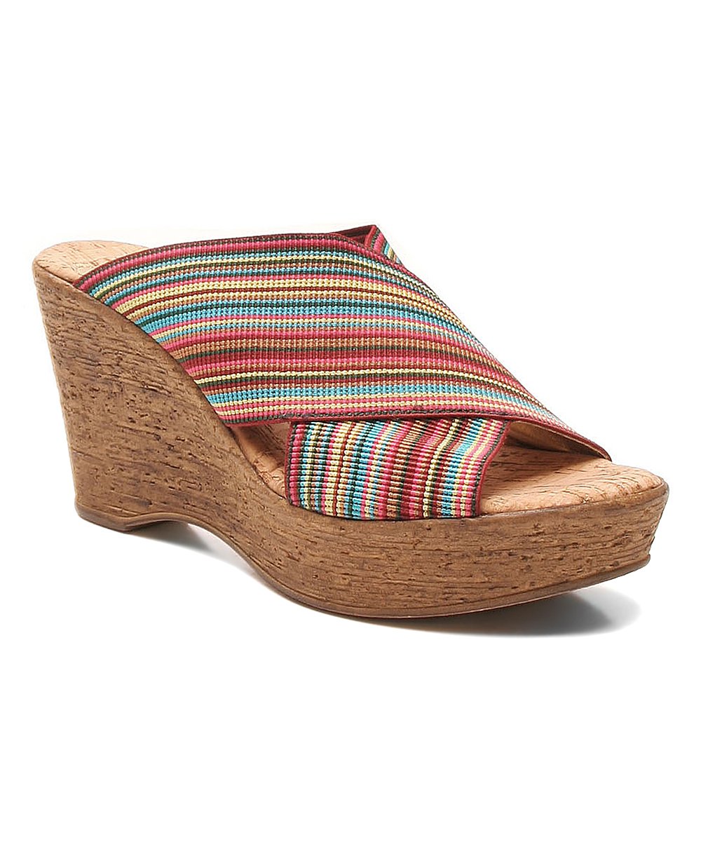 A pair of stylish Beachwalk sandals featuring a stretch gore upper and cork wedge outsole, perfect for summer outings.