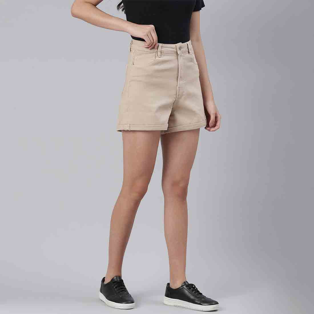 Beige high waist shorts with upturned hem and pockets, showcasing a stylish summer look.