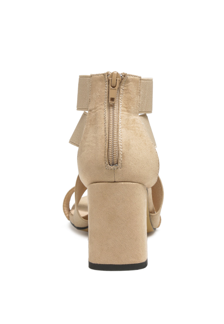 Benicia Elastic Strappy Block Heel Sandals featuring a stylish strappy design and block heel, made from microfiber with a back zipper fastening.