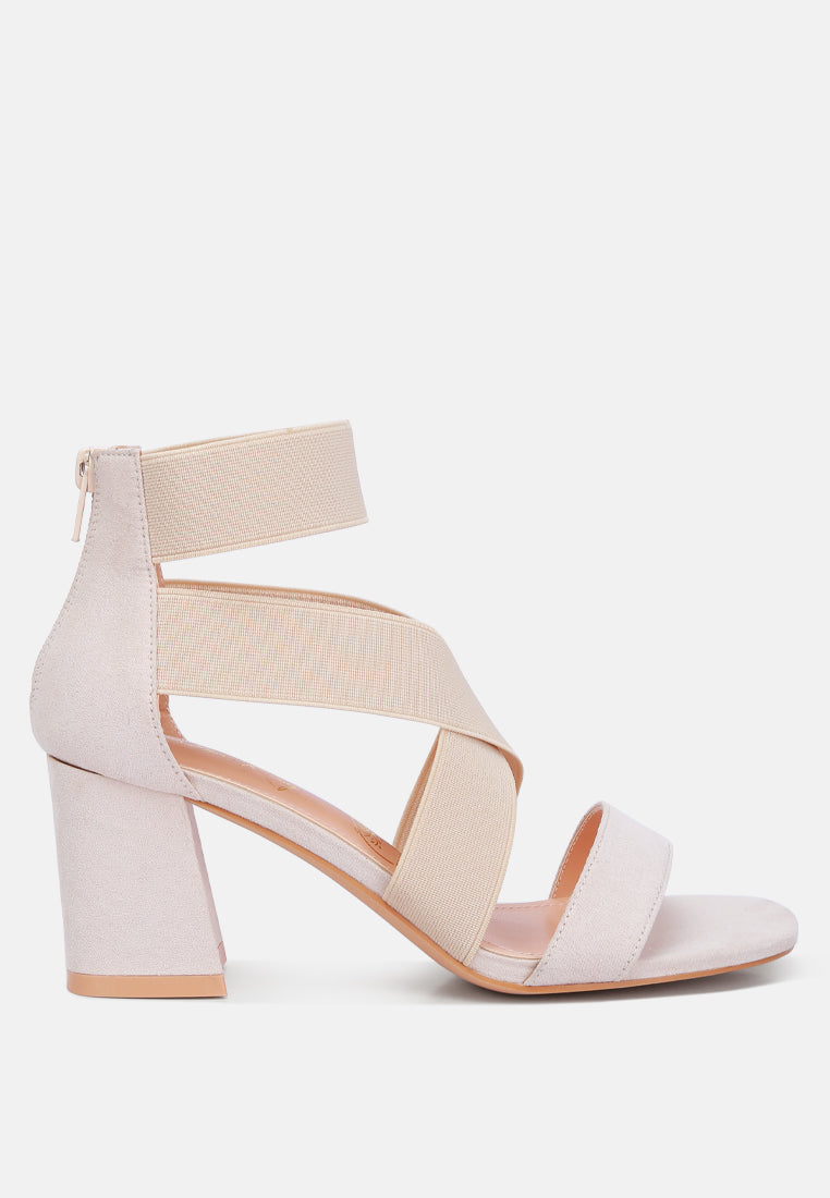 Benicia Elastic Strappy Block Heel Sandals featuring a stylish strappy design and block heel, made from microfiber with a back zipper fastening.