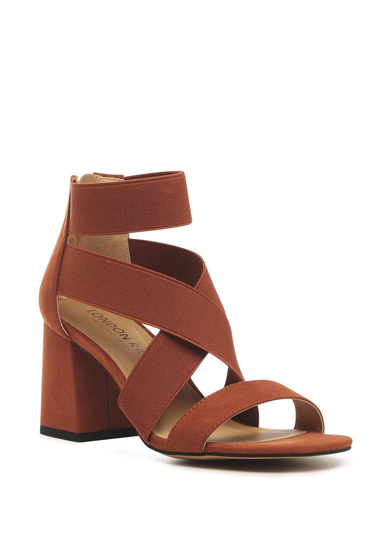 Benicia Elastic Strappy Block Heel Sandals featuring a stylish strappy design and block heel, made from microfiber with a back zipper fastening.