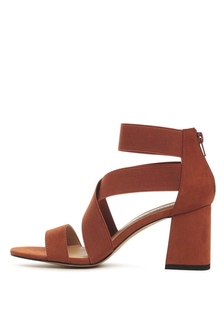 Benicia Elastic Strappy Block Heel Sandals featuring a stylish strappy design and block heel, made from microfiber with a back zipper fastening.