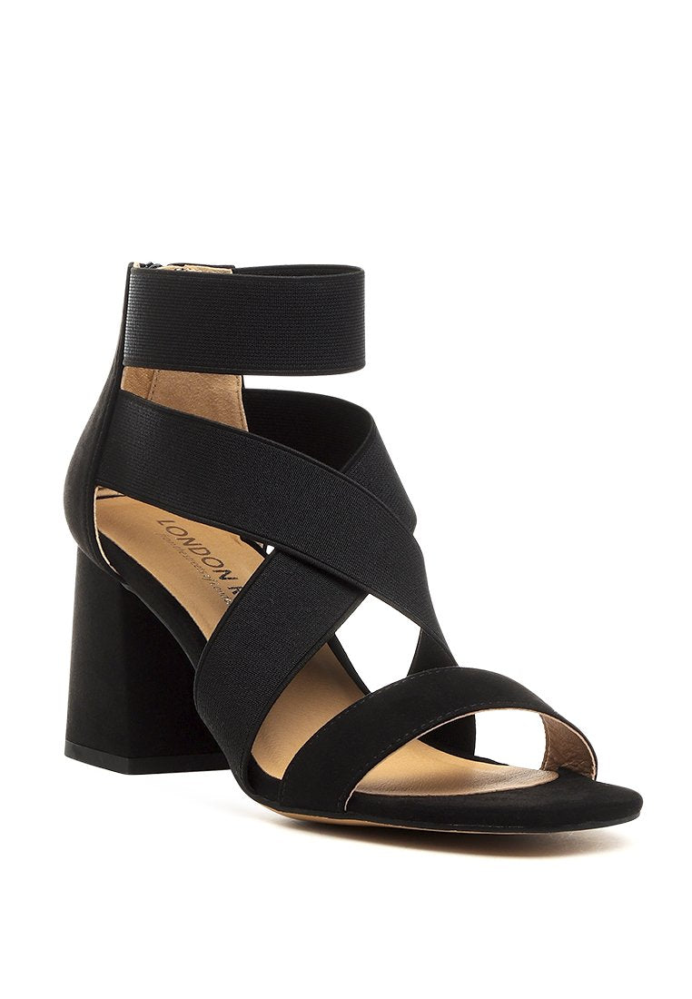 Benicia Elastic Strappy Block Heel Sandals featuring a stylish strappy design and block heel, made from microfiber with a back zipper fastening.