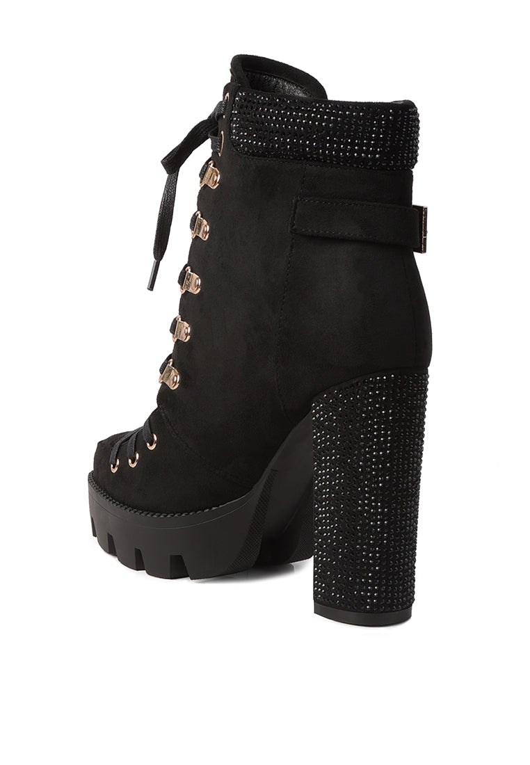 Stylish Birch Block Heeled Ankle Boots with rhinestone detailing, cushion collar, and sturdy lug sole.