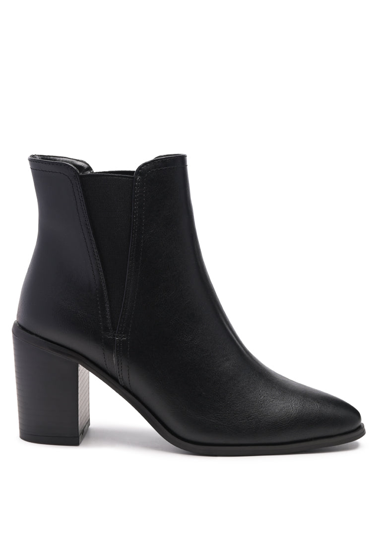 A pair of stylish block heeled Chelsea boots in black PU material, featuring a closed pointed toe and a sturdy block heel, perfect for autumn wear.