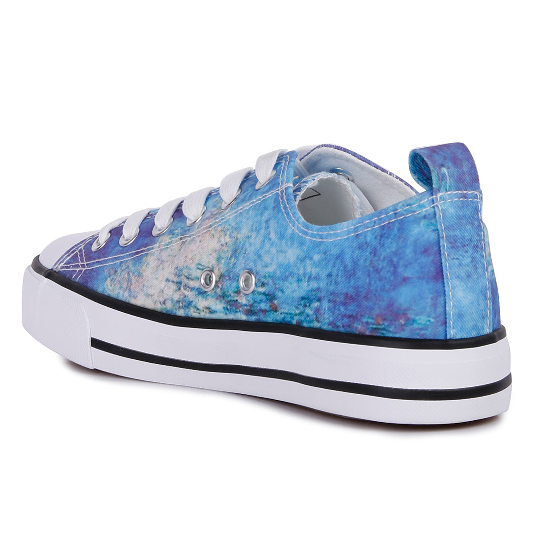 A pair of blue tie dye canvas sneakers with lace-up design and soft cushion innersole, perfect for casual wear.