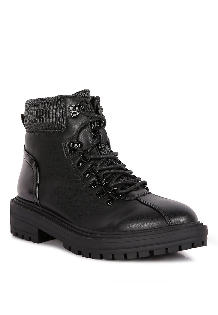 Stylish Boundless Faux Leather Ankle Boots with quilted collar and side zipper, perfect for outdoor adventures.