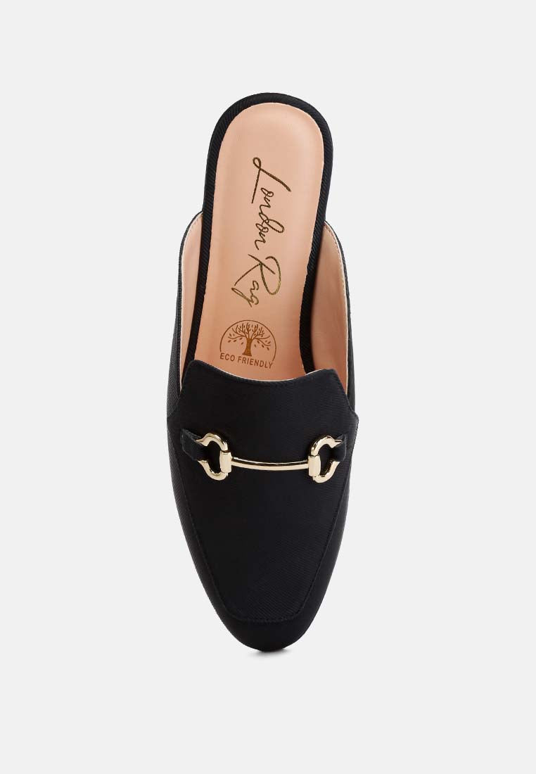 Briar Horsebit Embellishment Slip On Mules featuring a sleek canvas upper and stylish horsebit detail.