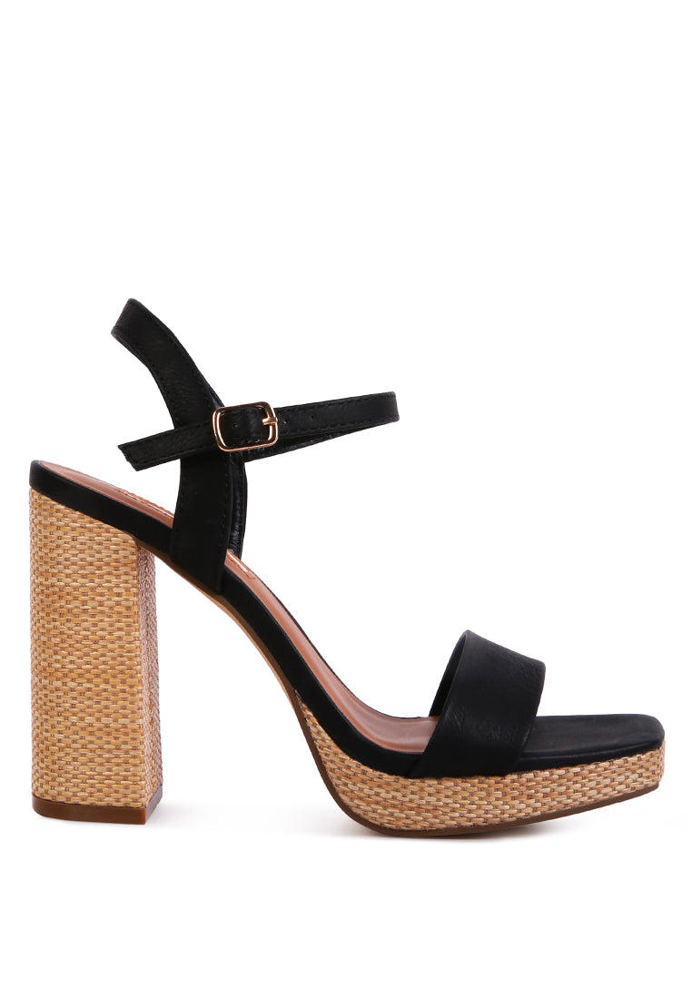 Buxor Woven Textured High Block Heeled Sandals featuring a stylish woven design, open square toe, and pin buckle closure.