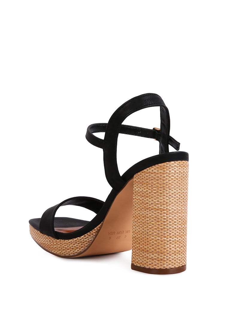 Buxor Woven Textured High Block Heeled Sandals featuring a stylish woven design, open square toe, and pin buckle closure.