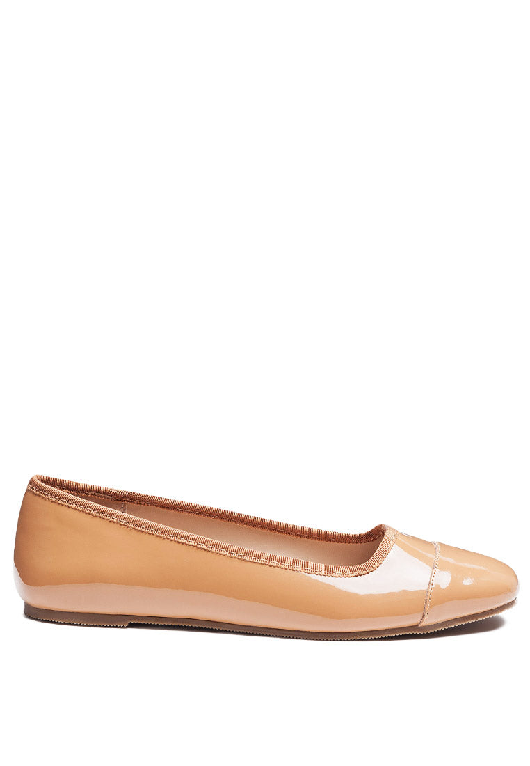 Camella Round Toe Ballerina Flat Shoes featuring a sleek design with a round toe and slip-on style, made from durable polyurethane.