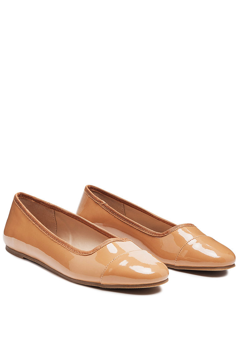 Camella Round Toe Ballerina Flat Shoes featuring a sleek design with a round toe and slip-on style, made from durable polyurethane.