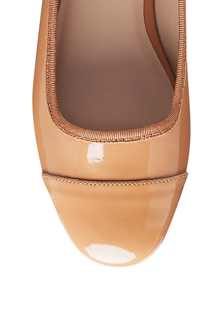 Camella Round Toe Ballerina Flat Shoes featuring a sleek design with a round toe and slip-on style, made from durable polyurethane.