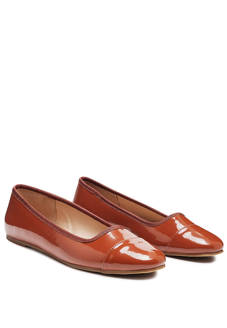 Camella Round Toe Ballerina Flat Shoes featuring a sleek design with a round toe and slip-on style, made from durable polyurethane.