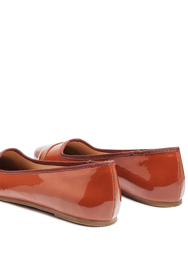 Camella Round Toe Ballerina Flat Shoes featuring a sleek design with a round toe and slip-on style, made from durable polyurethane.