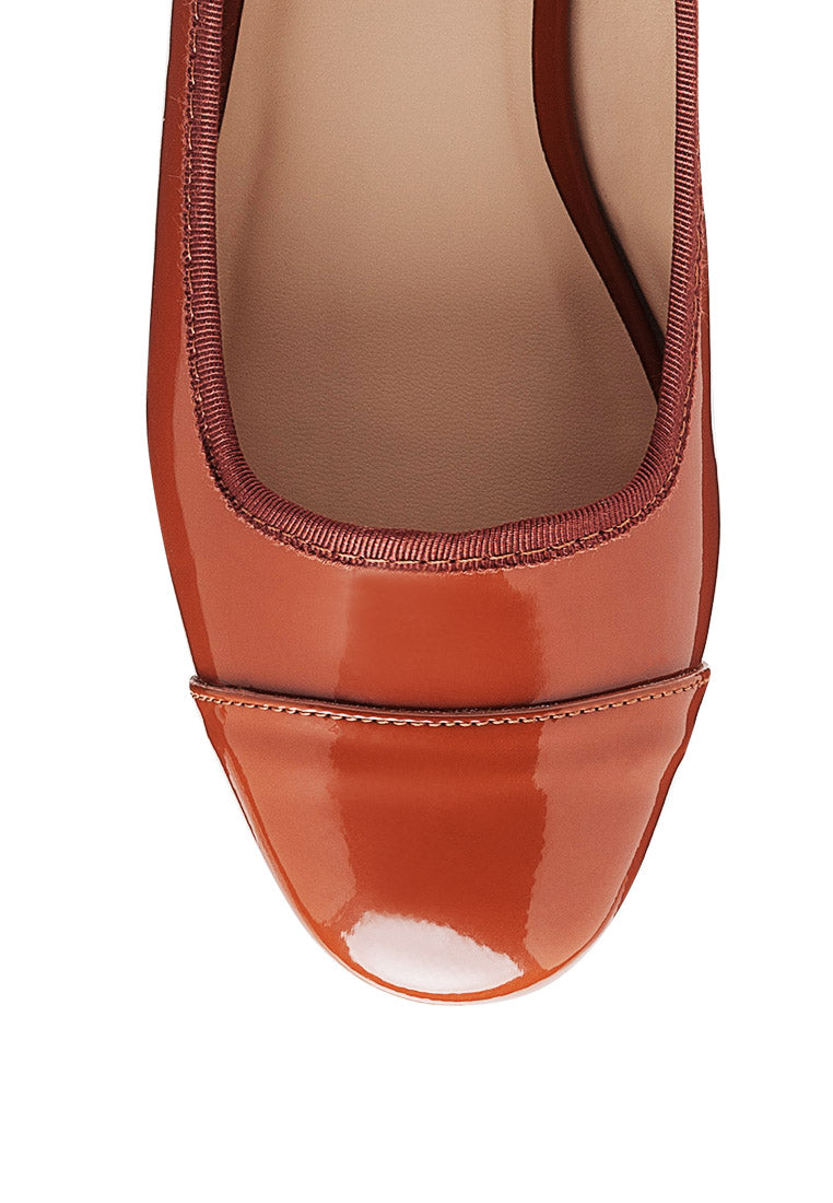 Camella Round Toe Ballerina Flat Shoes featuring a sleek design with a round toe and slip-on style, made from durable polyurethane.