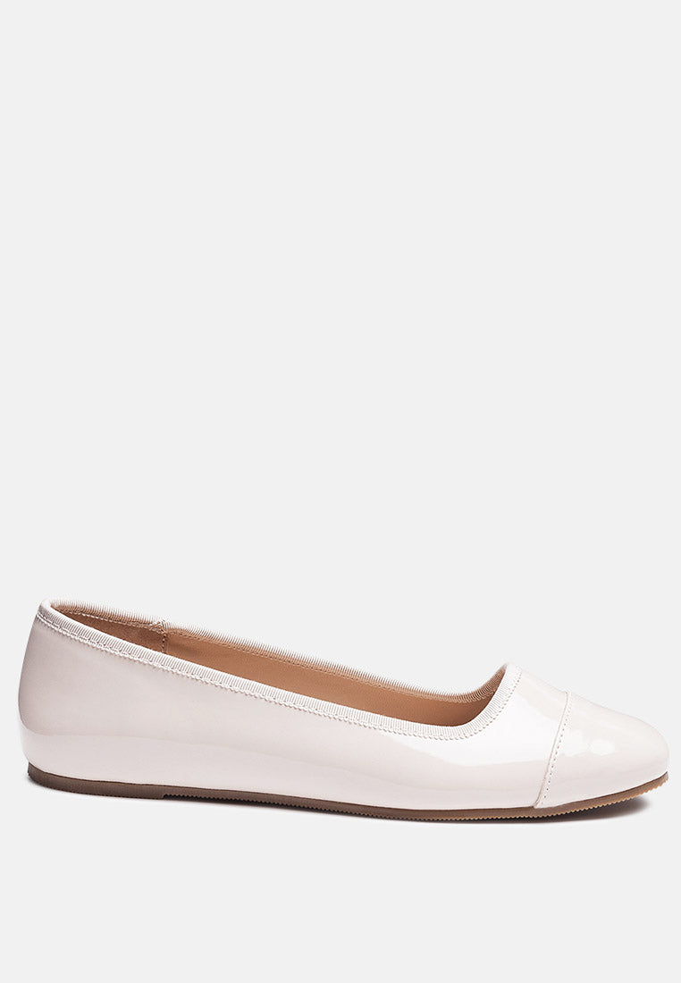 Camella Round Toe Ballerina Flat Shoes featuring a sleek design with a round toe and slip-on style, made from durable polyurethane.