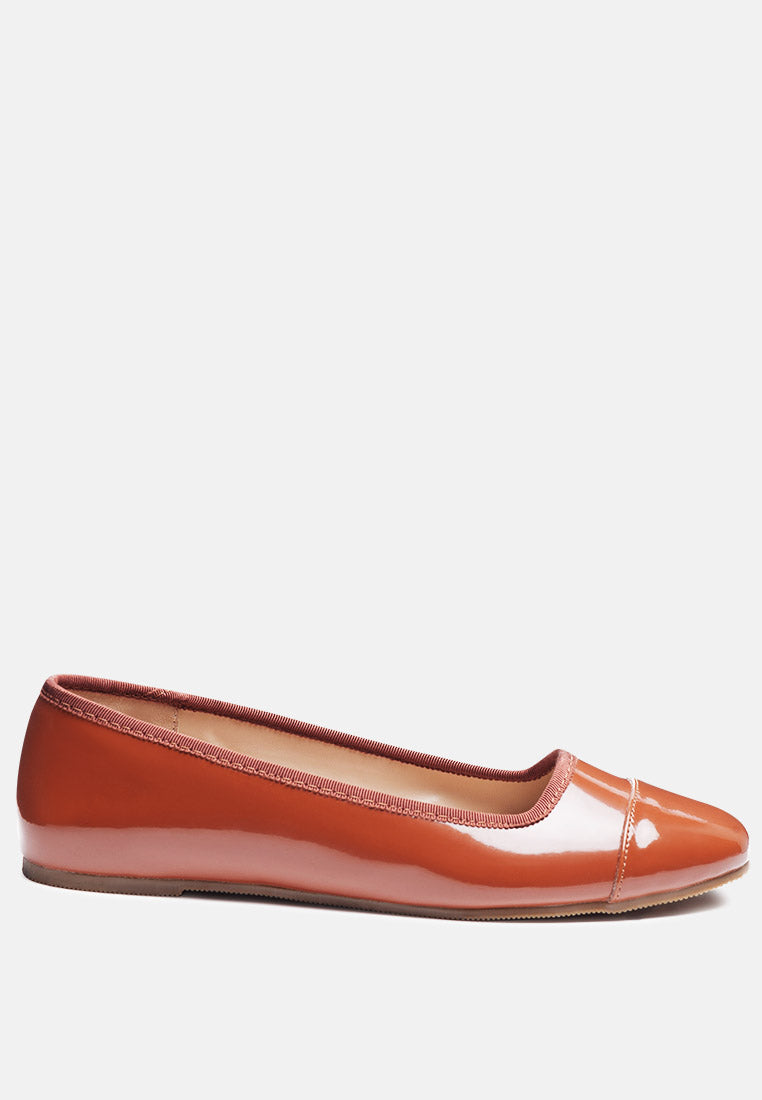 Camella Round Toe Ballerina Flat Shoes featuring a sleek design with a round toe and slip-on style, made from durable polyurethane.