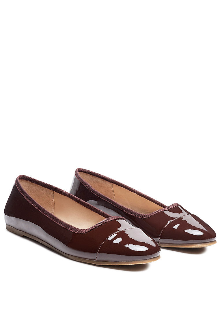 Camella Round Toe Ballerina Flat Shoes featuring a sleek design with a round toe and slip-on style, made from durable polyurethane.