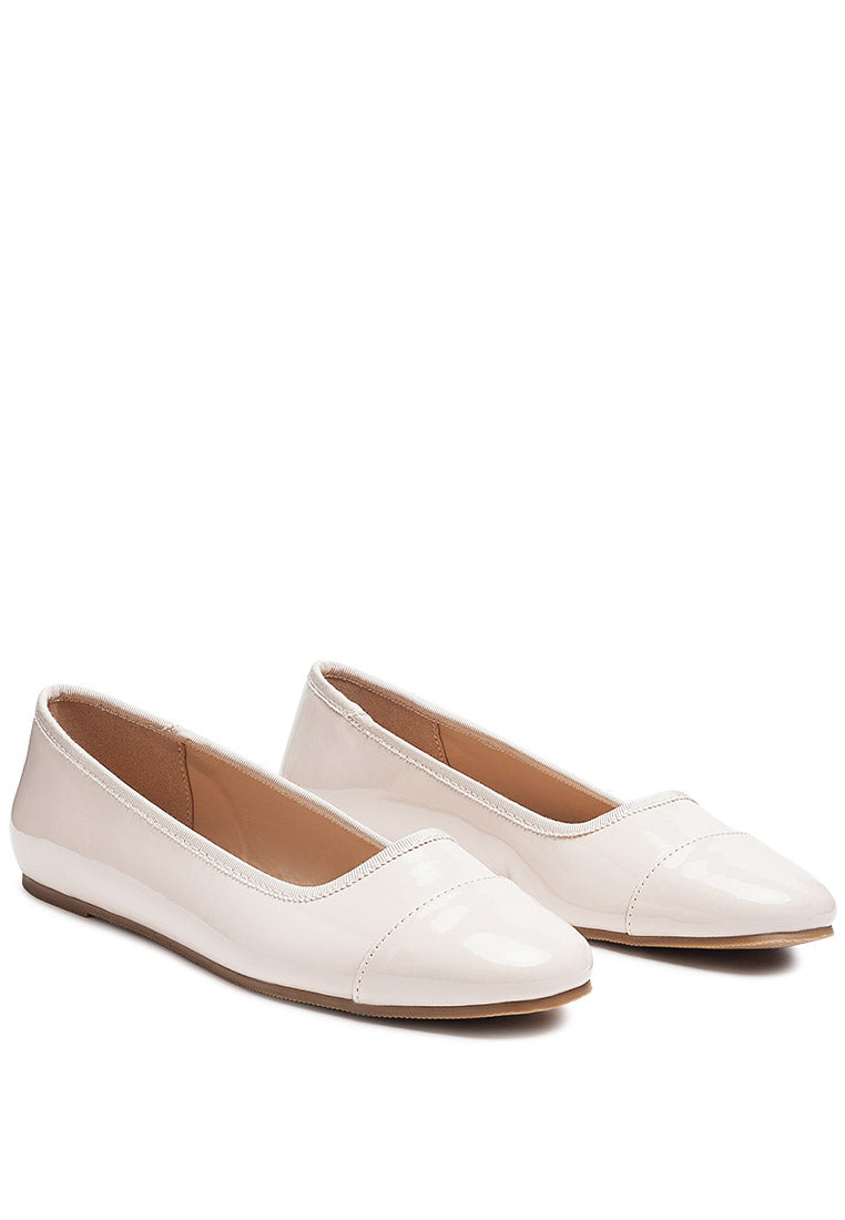 Camella Round Toe Ballerina Flat Shoes featuring a sleek design with a round toe and slip-on style, made from durable polyurethane.