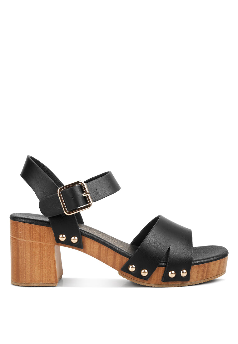 Campbell Faux Leather Textured Block Heel Sandals featuring a stylish design with a textured block heel and stud details.